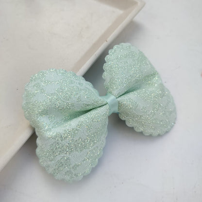 Frida Handcrafted Glittery Bow Hair Clip